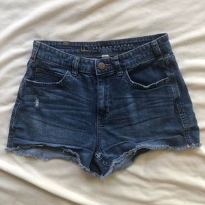 Lauren Conrad distressed high waisted shorts.